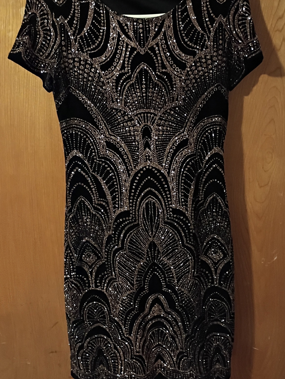 Shimmering Black Dress with Rose Gold Glitter Embellishments